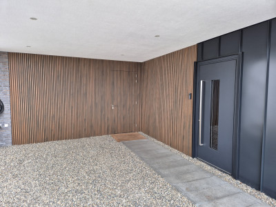 Tuinhuis met composiet gevelbekleding in Velsen